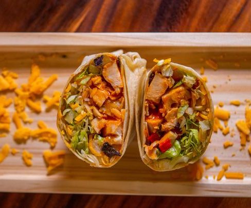 Buffalo Chicken Wrap with celery, cheddar, and blue cheese dressing