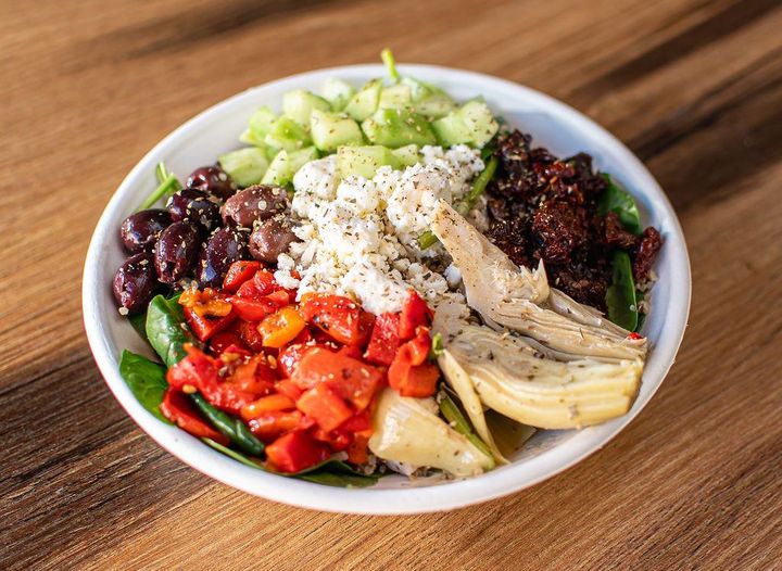 Greek Warrior Bowl with chicken, feta, artichoke, and olives